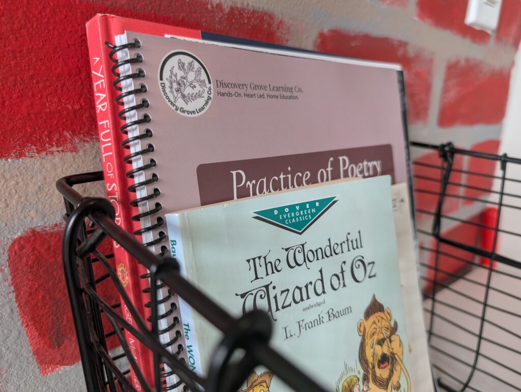homeschool morning basket with poetry journal and books